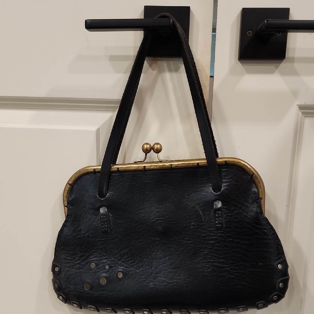 Elegant Black Leather Shoulder Bags with Metallic Accents